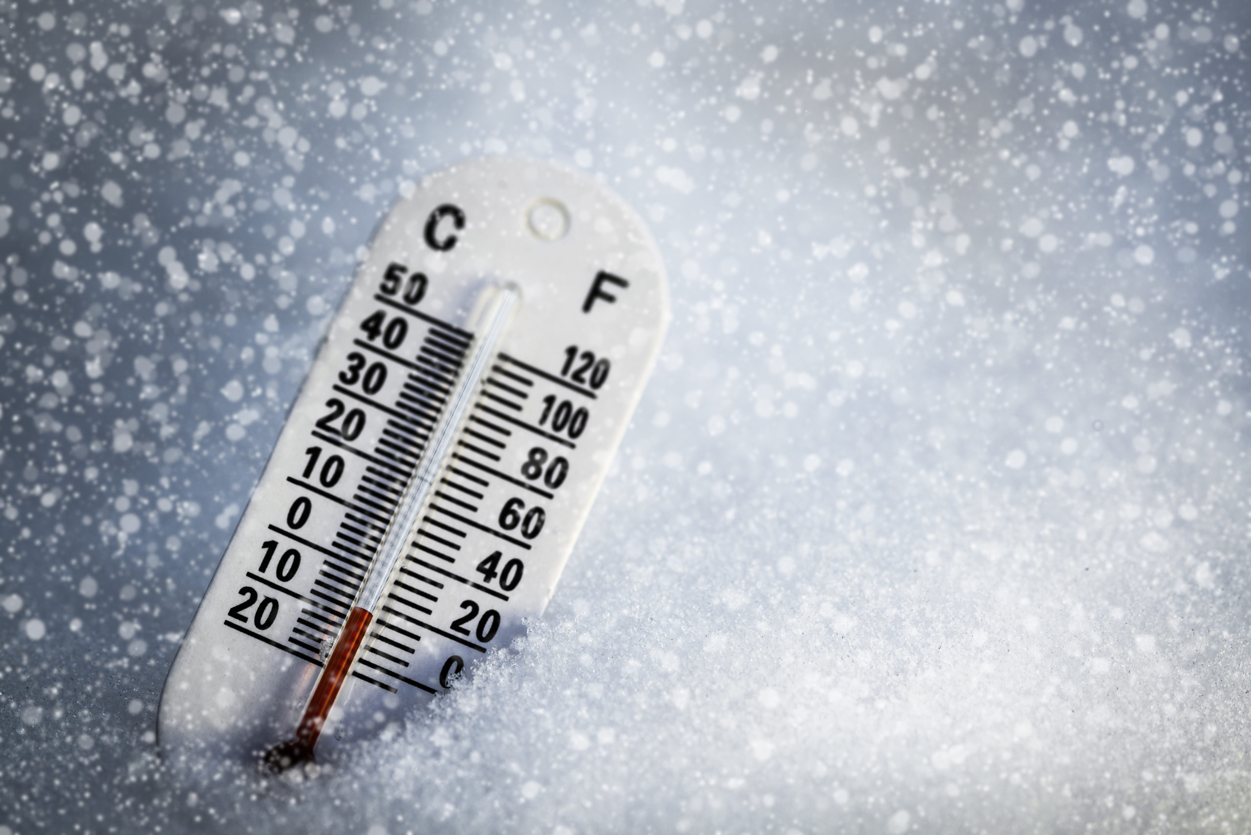 Thermometer showing winter temperatures and heating demand