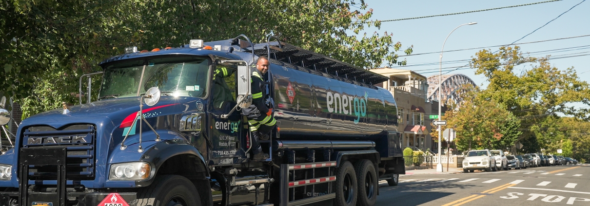 Energo truck under bridge during heating oil delivery route