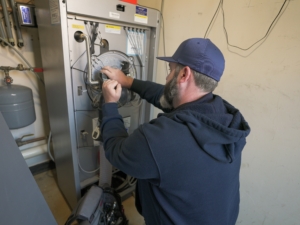 Energo technician working on equipment