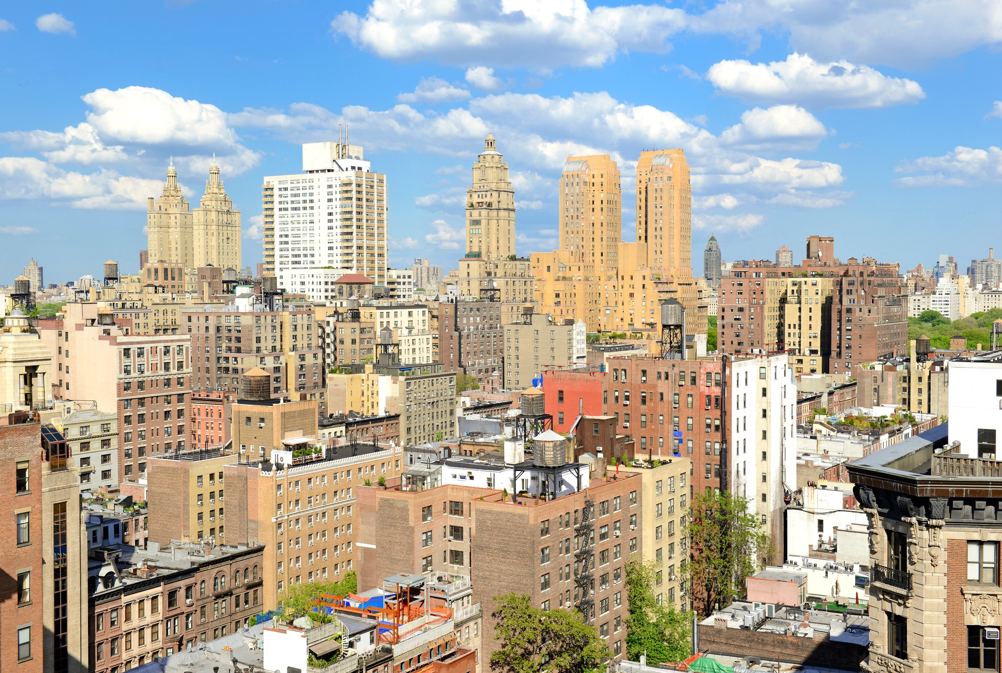 NYC skyline buildings with bright blue sky