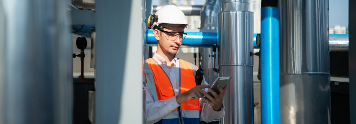 Engineer inspects the completed air conditioning and water system