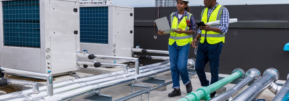 Energo technicians on rooftop performing HVAC maintenance