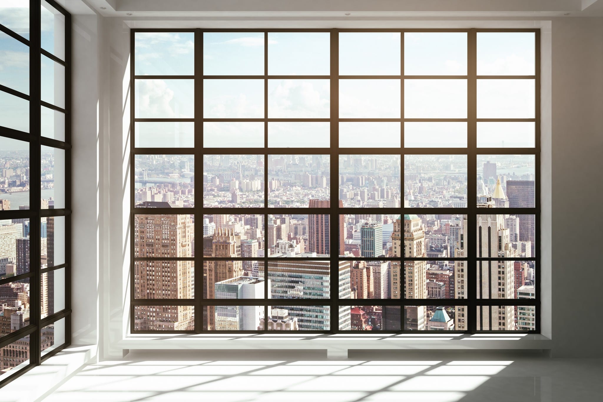 NYC skyline view from modern high-rise apartment window