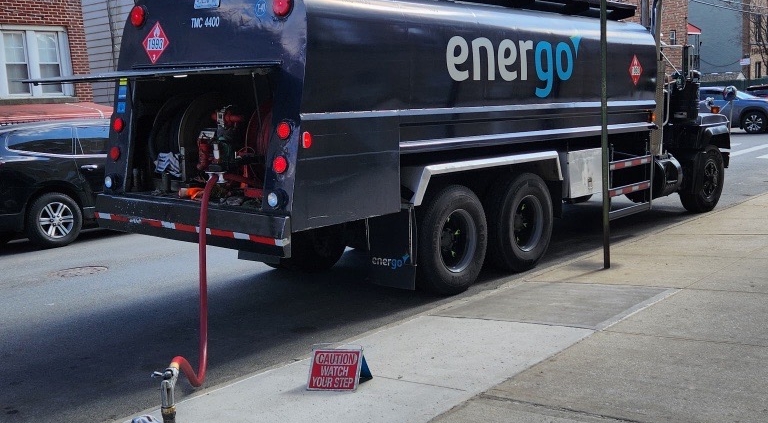 Energo fuel truck parked curbside during residential oil delivery