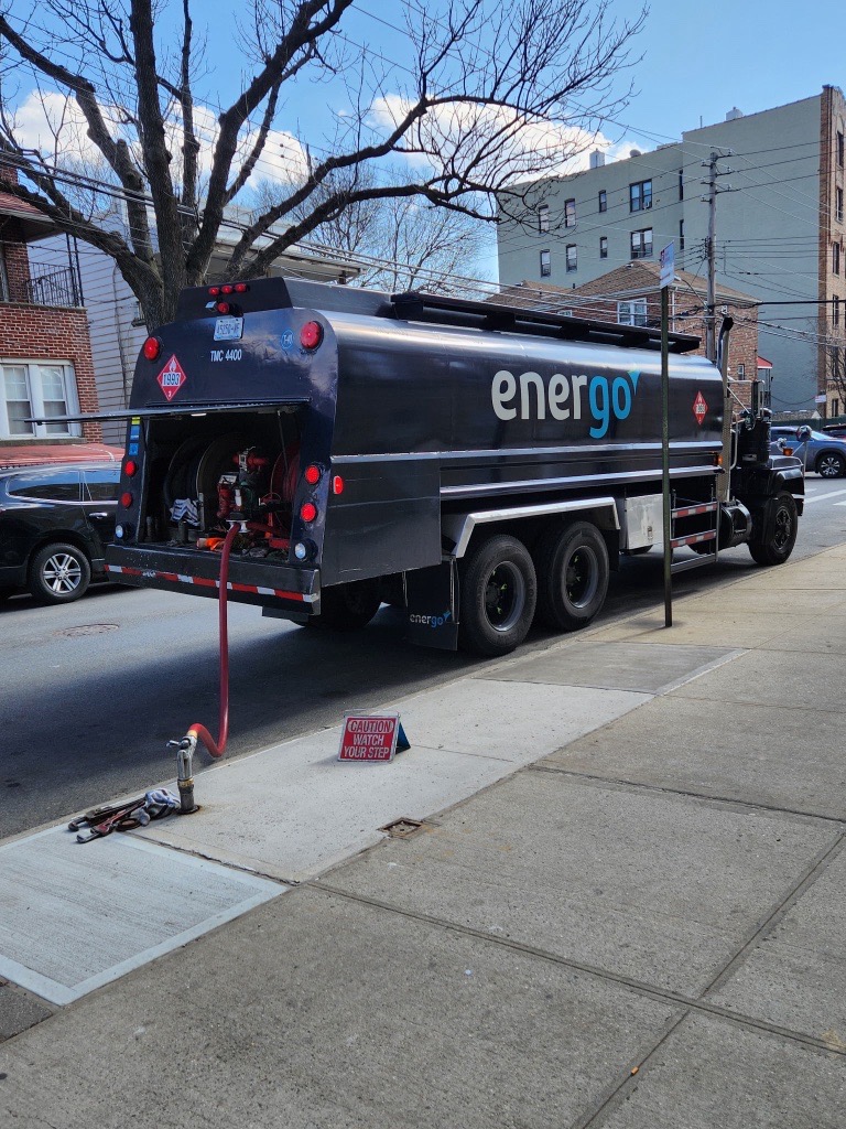 Energo fuel truck parked curbside during residential oil delivery