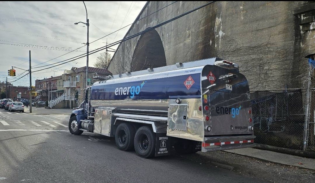 Energo branded heating oil truck parked by industrial facility